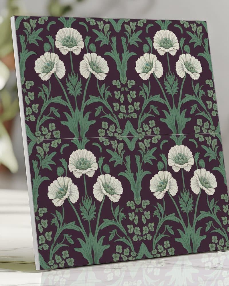 Tile featuring a repeating pattern of white poppies and green foliage on a dark purple background.