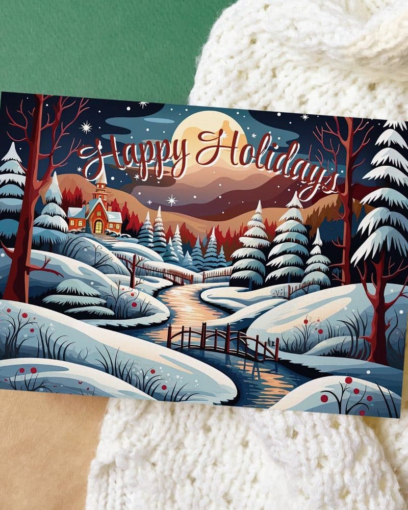 A snowy winter village scene with a church, river, and bridge at night. The words Happy Holidays are displayed across the top.
