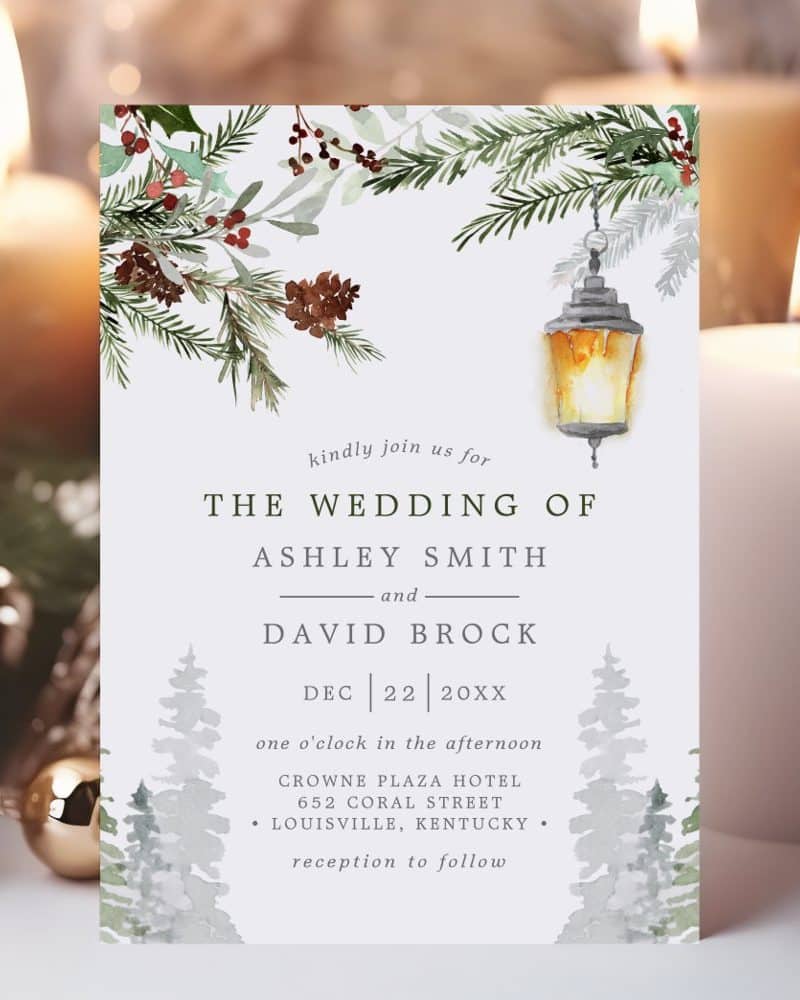 Wedding invitation for Ashley Smith and David Brock, featuring a wintery design with pine branches, berries, and a lantern.