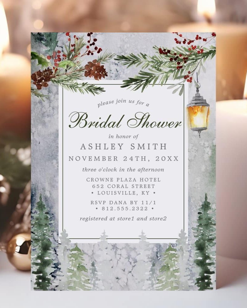 Bridal shower invitation for Ashley Smith, featuring a winter woodland scene with a lantern.