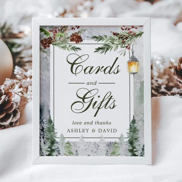 White Framed Sign With Wintery Design; Text Reads Cards And Gifts, Love And Thanks, Ashley &Amp; David.