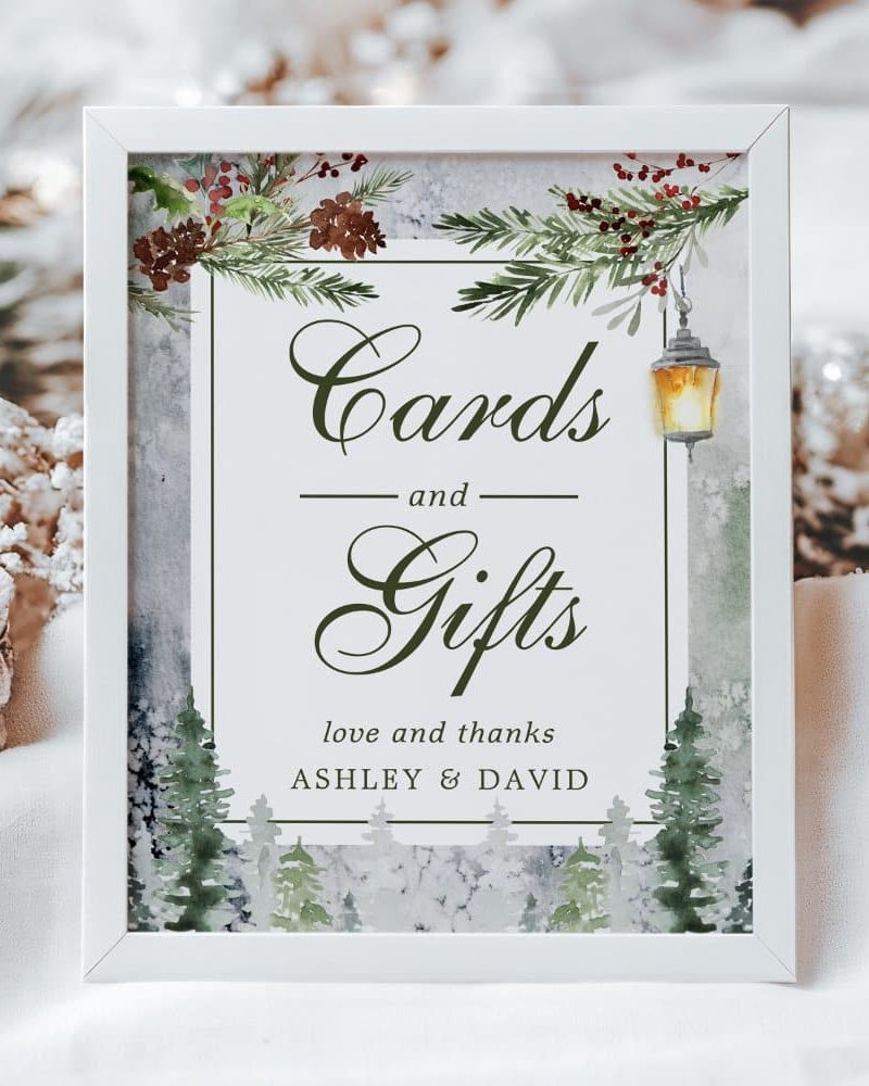 White framed sign with wintery design; text reads Cards and Gifts, love and thanks, Ashley & David.