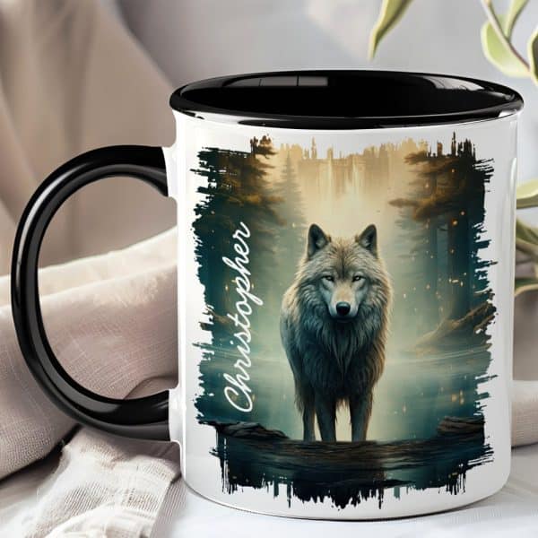 A Black-Handled Mug With A Wolf Illustration. The Wolf Stands In A Misty Forest By Water. The Name Christopher Is Written On The Mug.