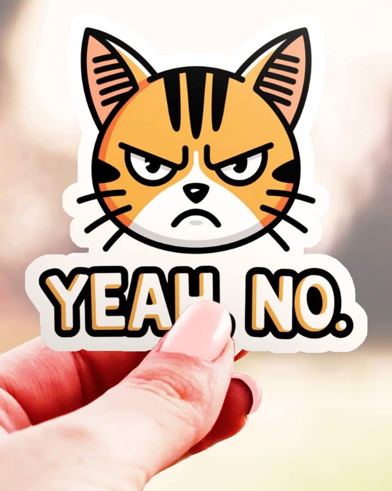 A sticker featuring an angry orange tabby cat with the words Yeah No below it.