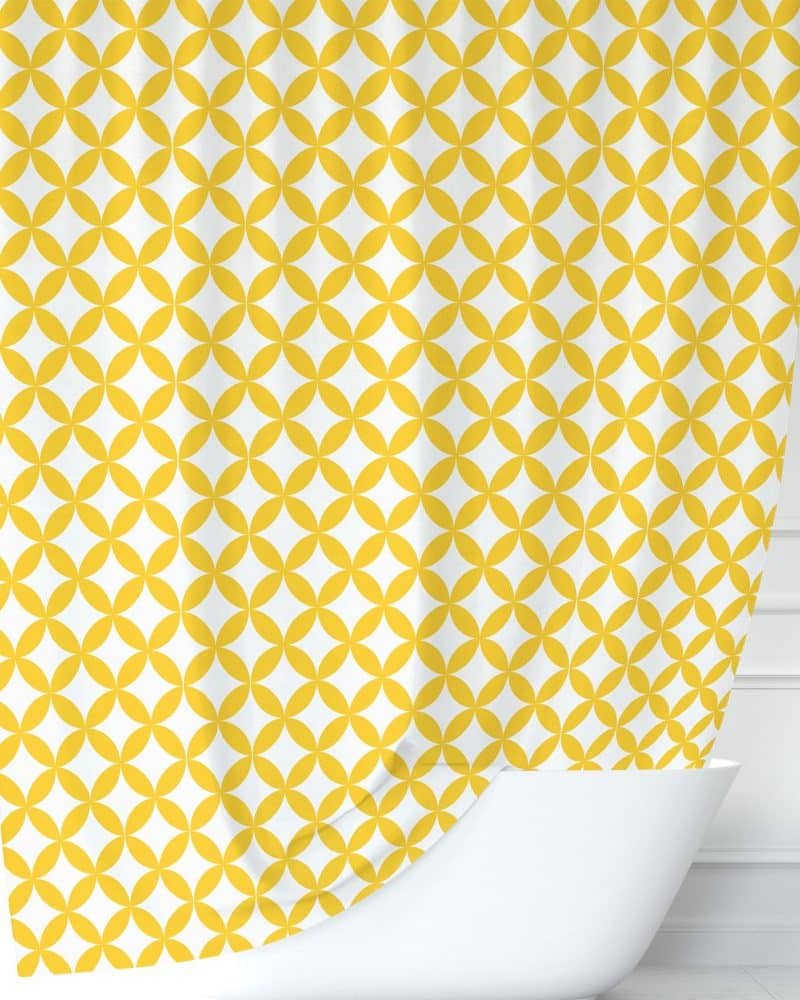 Yellow and white patterned shower curtain.