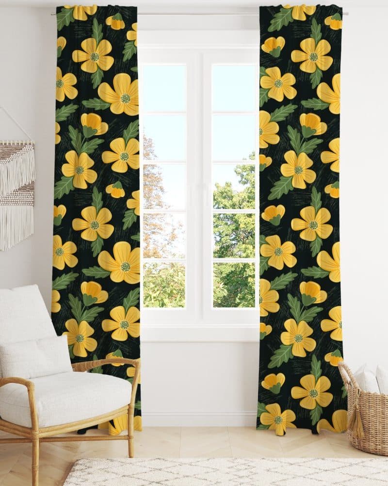 Pair of dark-green curtains with a yellow flower pattern hanging in front of a window.
