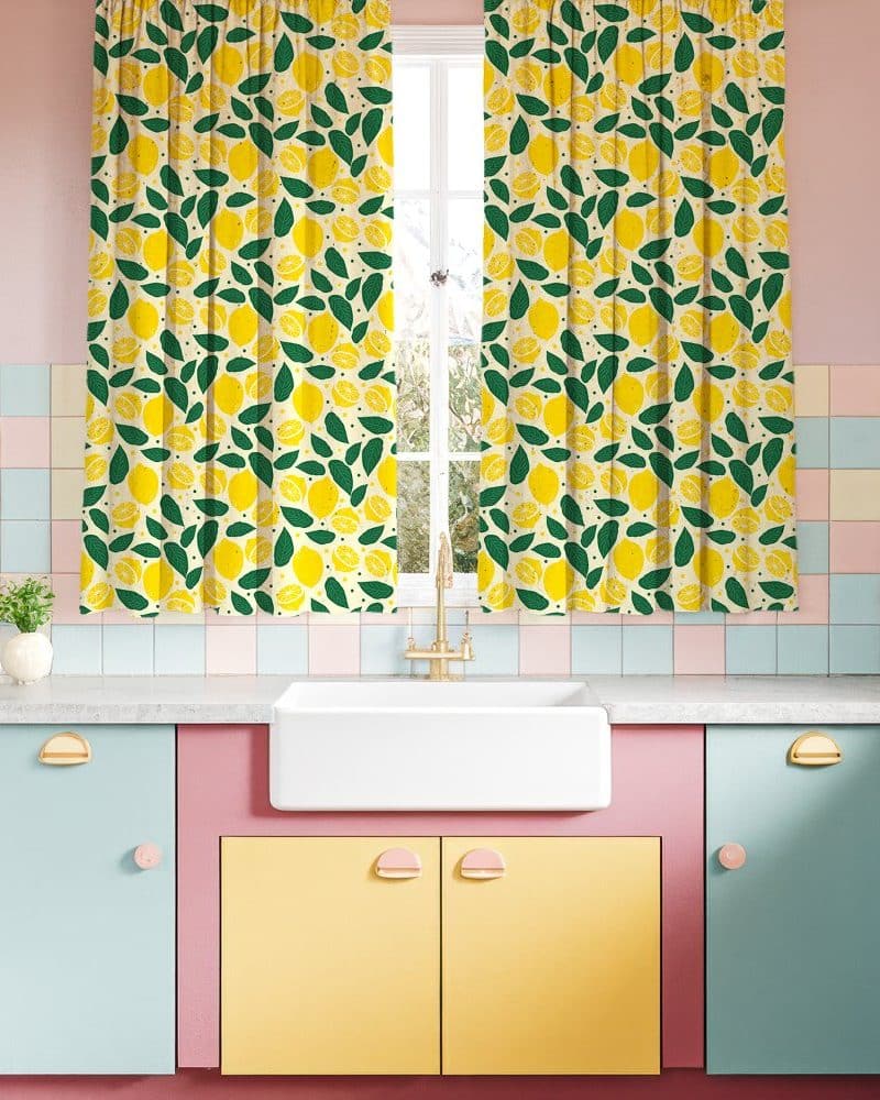 A pair of lemon-print kitchen curtains.