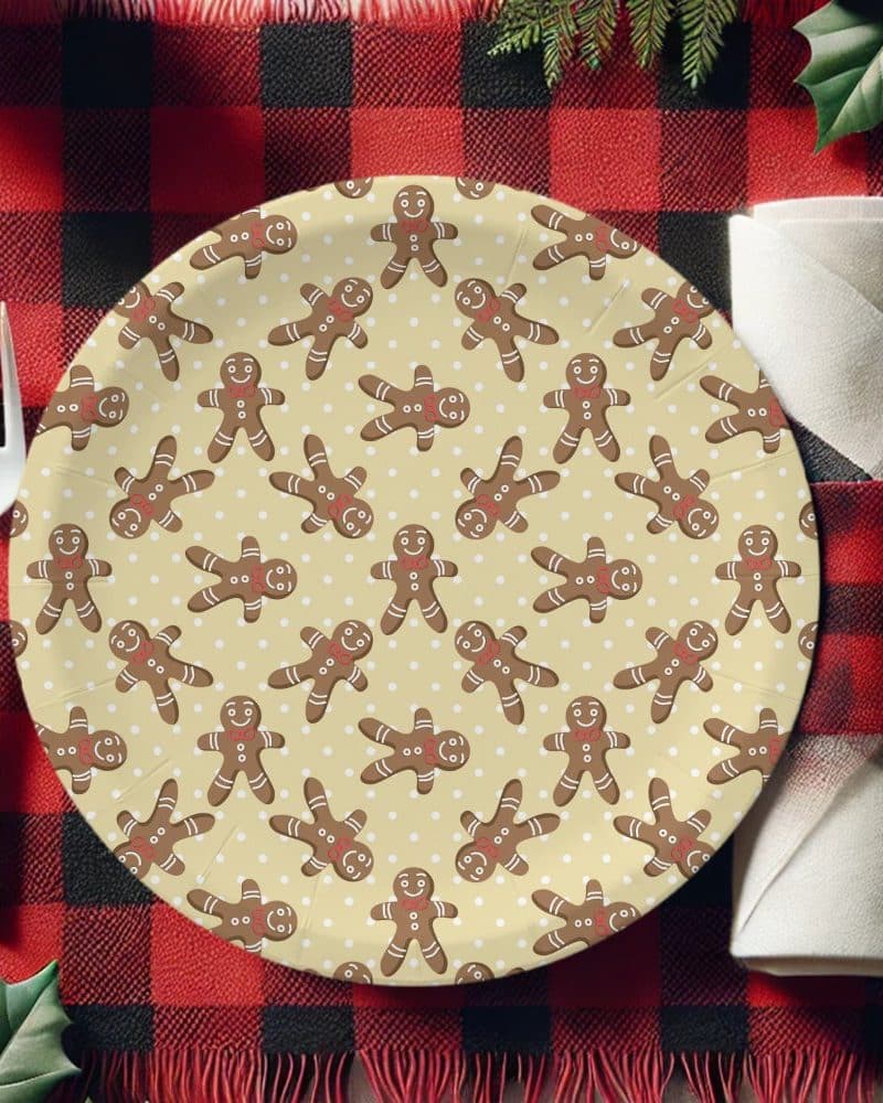 Paper plate with a pattern of gingerbread men on a beige background.