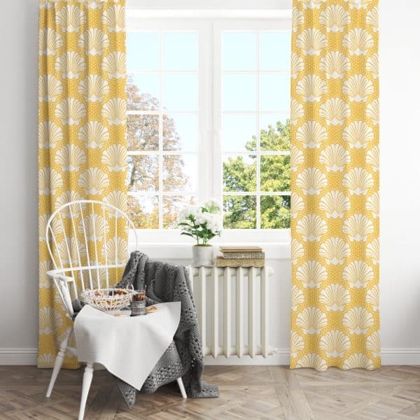 Pair Of Mustard Yellow Curtains With A White Seashell Pattern, Hanging In A Bright Window.