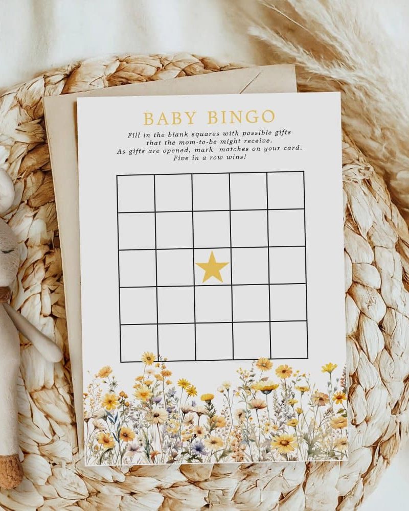 Baby shower bingo card with a floral border.