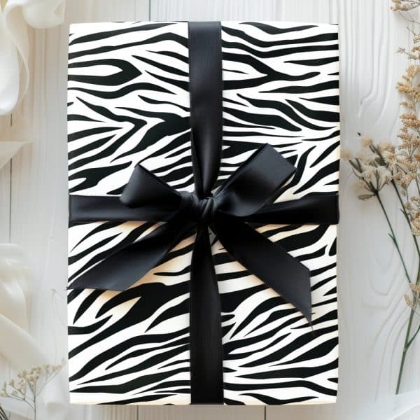 Zebra-Striped Gift Box With A Black Ribbon.